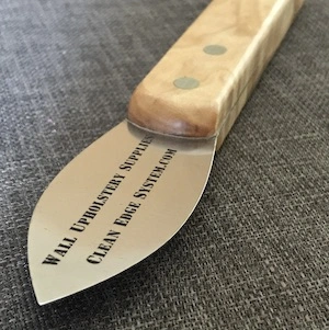 fabric wall spatula in the shape of a bay leaf