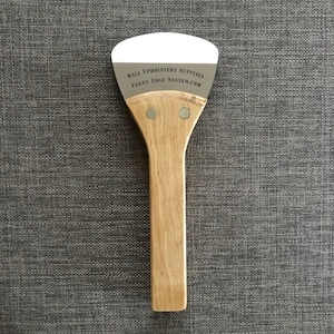 fabric spatula with wood handle and steel plate