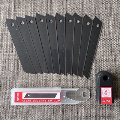 open box with 10 tungsten Sharpe black blades